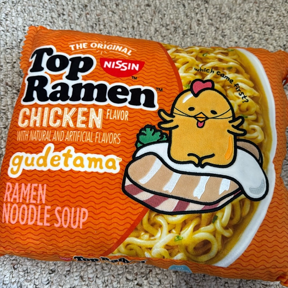 Gudetama Top Ramen crinkle pillow by Kidrobot.